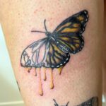 Tatouage papillon aquarelle